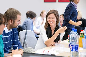 A female employee attending a workshop.
